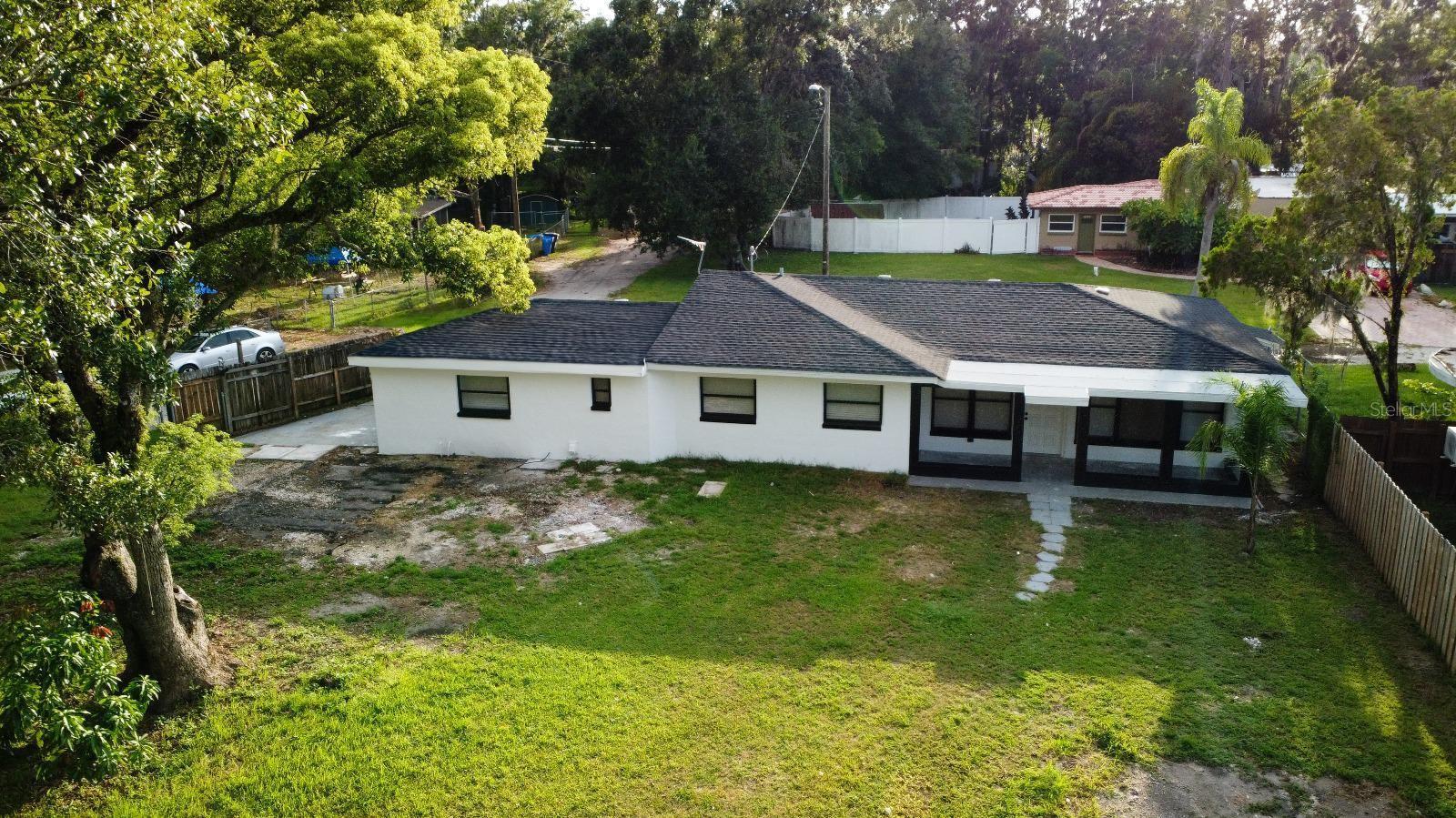 Welcome to this stunning, recently renovated 5-bedroom, 2-bath residence conveniently located in Lutz. From the moment you step inside, you will notice the extensive upgrades that have been made. This home has been thoughtfully updated with interior and exterior paint, kitchen cabinets and quartz countertops, porcelain tile flooring throughout, fully remodeled bathrooms, new light fixtures, and much MORE. This property offers the structure and quality needed for its new owner.
For those who enjoy an open concept, this home brings out the best of each space, with every room strategically located. Schedule your private showing TODAY!