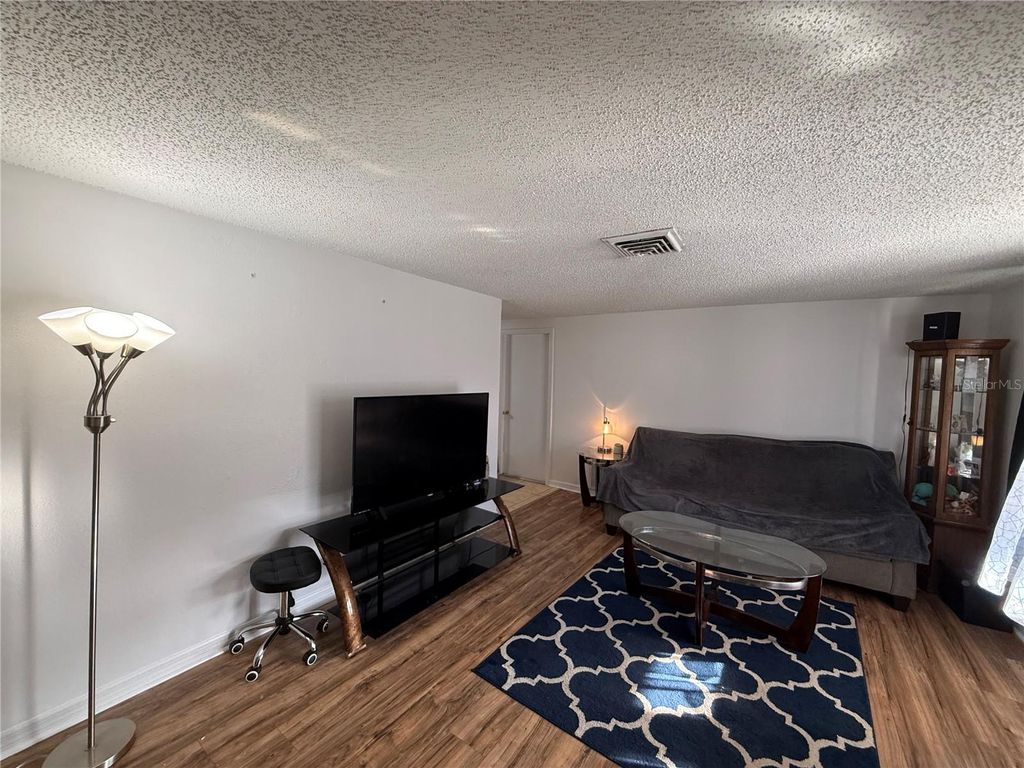 Photo of 8548 Bass Lake Drive, New Port Richey, FL 34654 (MLS # W7883208)