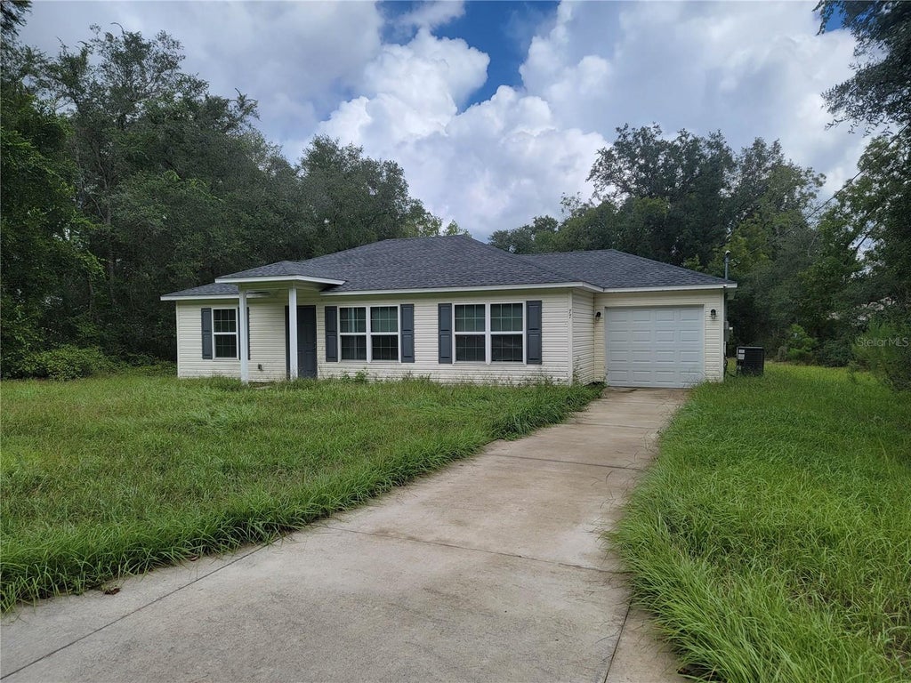 Photo of 77 Fisher Way Course, Ocklawaha, FL 32179 (MLS # OM731612)