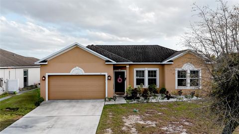 Photo of 318 Gladesdale Street, Haines City, FL 33844 (MLS # P4933956)