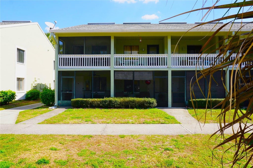 Photo of 20857 Haulover Cove #B12, Lutz, FL 33558 (MLS # W7888245)