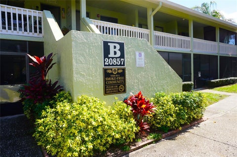 Photo of 20857 Haulover Cove #B12, Lutz, FL 33558 (MLS # W7888245)