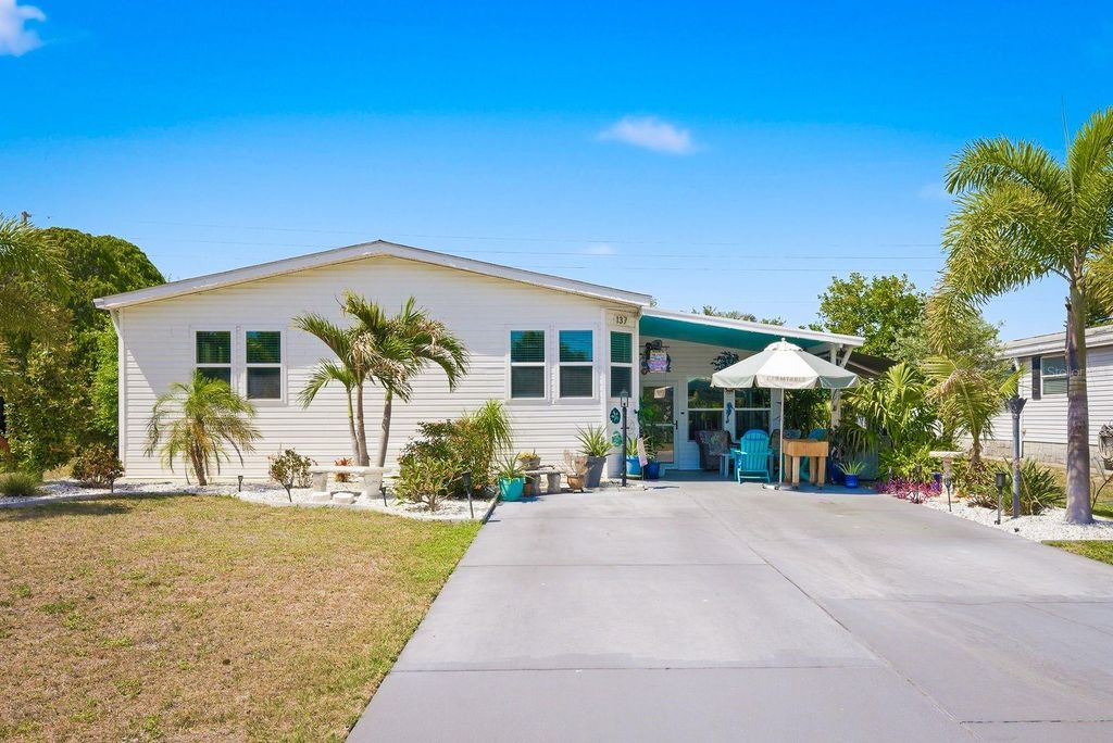 Photo of 137 Lake Tarpon Drive #18, Palm Harbor, FL 34684 (MLS # TB8503825)