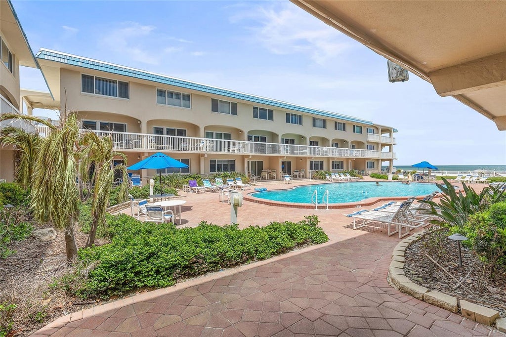 Photo of 111 N Atlantic Avenue #A101, New Smyrna Beach, FL 32169 (MLS # NS1089058)