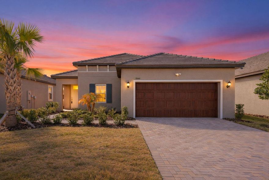 Discover effortless Florida living in the sought-after Medley at Mirada 55+ active community. This two year old Mediterranean-style home is immaculate, move-in ready, and an ideal alternative to waiting for new construction. The home offers 2 bedrooms, 2 bathrooms, and a flexible den or office, all within a bright open-concept Splendor layout designed for both comfortable daily living and entertaining. An oversized 2-car garage provides ample space for a golf cart, storage, or hobbies.The contemporary kitchen features upgraded GE stainless steel appliances, including a french door refrigerator, microwave, glass-top range with convection oven and air fryer. The Kinetico REVERSE OSMOSIS system provides high quality purified drinking water for added convenience. Additional upgrades include crown molding, a dedicated laundry room with cabinetry, Ring doorbell, and exterior flood lights, showcasing thoughtful attention to detail throughout. Enjoy 1,783 square feet of living space on a 6,075-square-foot maintenance-free homesite. Exterior maintenance, lawn care, irrigation, basic cable, and internet are included for truly low-maintenance living. Residents of Medley enjoy a private resort-style clubhouse with a sparkling pool, poolside bar and café, ballroom, billiards room, fitness center, and a full social calendar! Recreational amenities include pickleball, tennis, bocce ball, and shuffleboard with this home being just steps away from all of the fun! Ownership also includes membership to the Mirada freshwater lagoon, featuring sandy beaches, kayaking, swim areas, lounge seating, and food and beverage options, offering a vacation-like setting right inside the community. Conveniently located near I-75, the home is a short drive from The Shops at Wiregrass, Tampa Premium Outlets, KRATE Container Park, and Main Event Wesley Chapel, along with everyday shopping and dining. Nearby medical facilities include AdventHealth Zephyrhills and AdventHealth Dade City. Experience the ideal blend of comfort, convenience, and active 55+ living at Medley at Mirada!