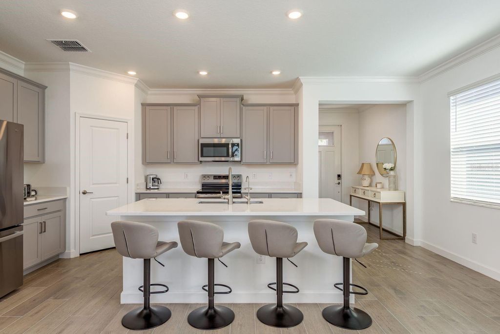 Photo of 10661 Tupper Cay Drive, San Antonio, FL 33576 (MLS # TB8472650)