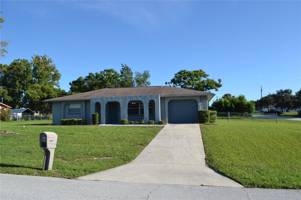 Photo of 1497 Coble Road, Spring Hill, FL 34608 (MLS # W7886061)