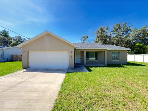 Photo of 190 Fisher Way, Ocklawaha, FL 32179 (MLS # O6419624)