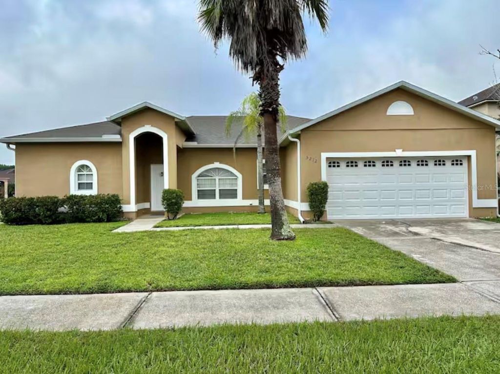 Photo of 5212 Jasmine Trace Lane, Kissimmee, FL 34758 (MLS # O6372389)