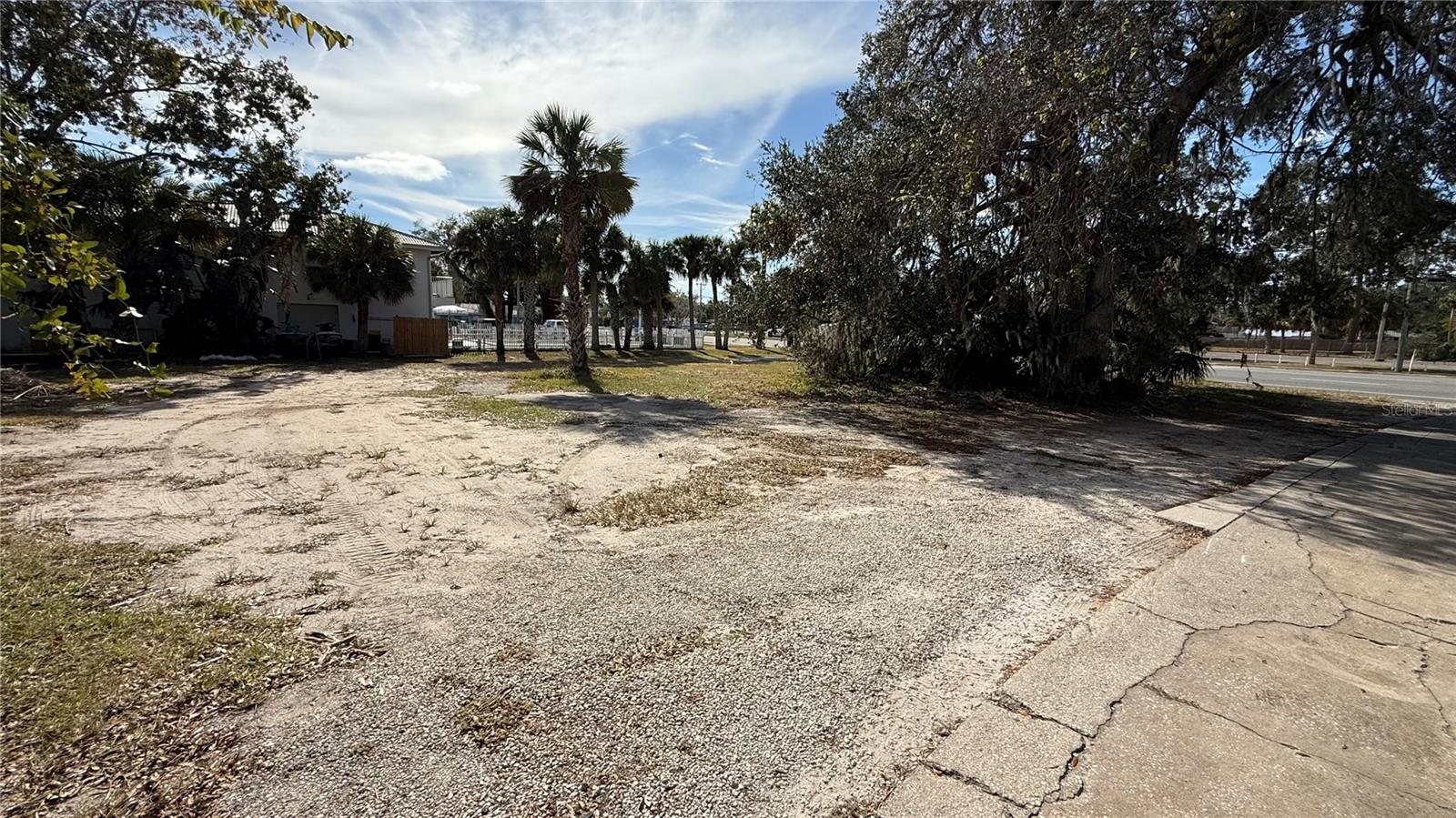 US 1 frontage. Zoned Commercial, with city approval, can be used for surface parking, short-term rentals, and retail.
Property backs up to canal that can lead to the intracoastal. Buyer must verify.