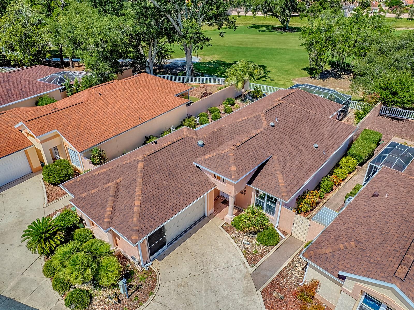 NEWER 2023 ROOF, BOND PAID, BROWARD WARRANTY, TERMITE BOND, AND TWO CAR GARAGE on this TURNKEY 2/2+ FLORIDA ROOM, GOLF COURSE COURTYARD VILLA located ACROSS THE STREET FROM SPANISH SPRINGS in HACIENDA VILLAS! SPECTACULAR GOLF COURSE VIEW of the 5th hole of the Championship course in Hacienda Hills. Enjoy the view from the Florida room or sitting in your IN GROUND HOT TUB in the expansive birdcage covering the large courtyard patio! Shade is offered by the remote controlled awning! This lovely villa offers diagonal tile with carpet insert throughout the dining, living area, and the Florida room with diagonal time in the kitchen, and carpet in the bedrooms. The kitchen has GRANITE countertops with diagonal tile backsplash, under cabinet lighting, a solar tube, and newer appliances. You'll also find SOLAR TUBES in the guest and primary bathrooms. Leaf filters were added with the new roof so low maintenance with the clean-up of your gutters. This is a GREAT LOCATION right around the corner from Spanish Springs for shopping, dining, and entertainment. Several Recreation Centers and 2 executive GOLF COURSES, Chula Vista and Mira Mesa close by for lots of fun! COME SEE ALL THIS VILLA AND THE SURROUNDING AREA HAS TO OFFER!