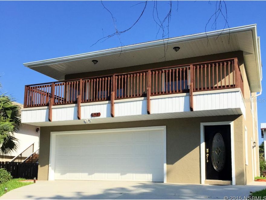 Bethune Beach Beauty! This large family home has a total of 5 bedrooms , 2 being on the 2nd level of the home, the expansive master suite on the 3rd floor and a totally separate 2 bedroom one bath in-law suite on the ground level.   Architect designed in 1997, the house maximizes water views of the river and ocean.  There is a fantastic porch with relaxing water views to the south, shared balcony for the 2 bedrooms on main living floor and a widow's walk with incredible views from the rooftop.This is a  perfect set up for in law suite , artist studio or man cave. Come and see the views from this great home on a quiet dead end street & just steps to the beach. ;Water: City