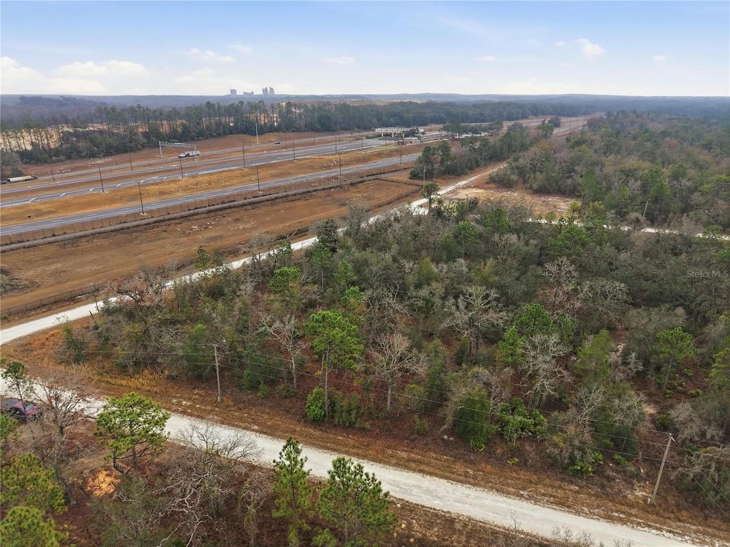 Photo of 14080 Cagarro Road, Brooksville, FL 34614 (MLS # W7882704)