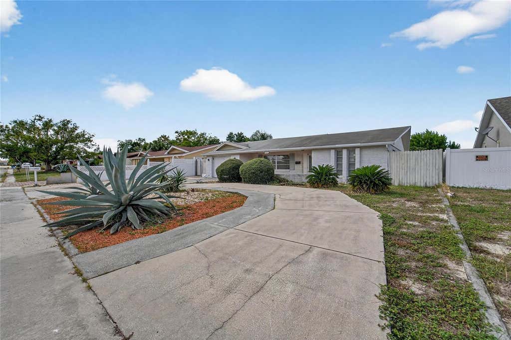 Photo of 10841 Piccadilly Road, Port Richey, FL 34668 (MLS # TB8540052)