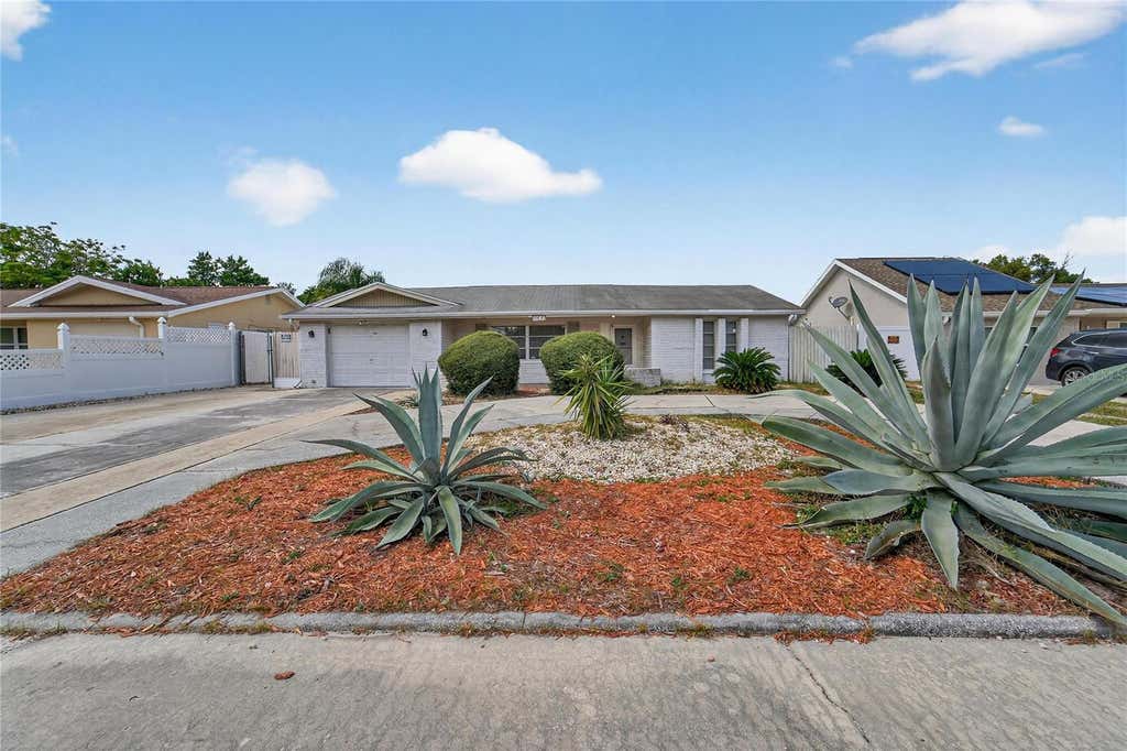 Photo of 10841 Piccadilly Road, Port Richey, FL 34668 (MLS # TB8540052)