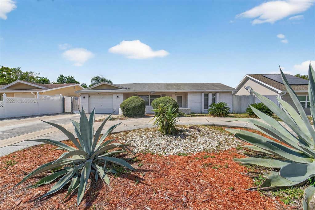 Photo of 10841 Piccadilly Road, Port Richey, FL 34668 (MLS # TB8540052)