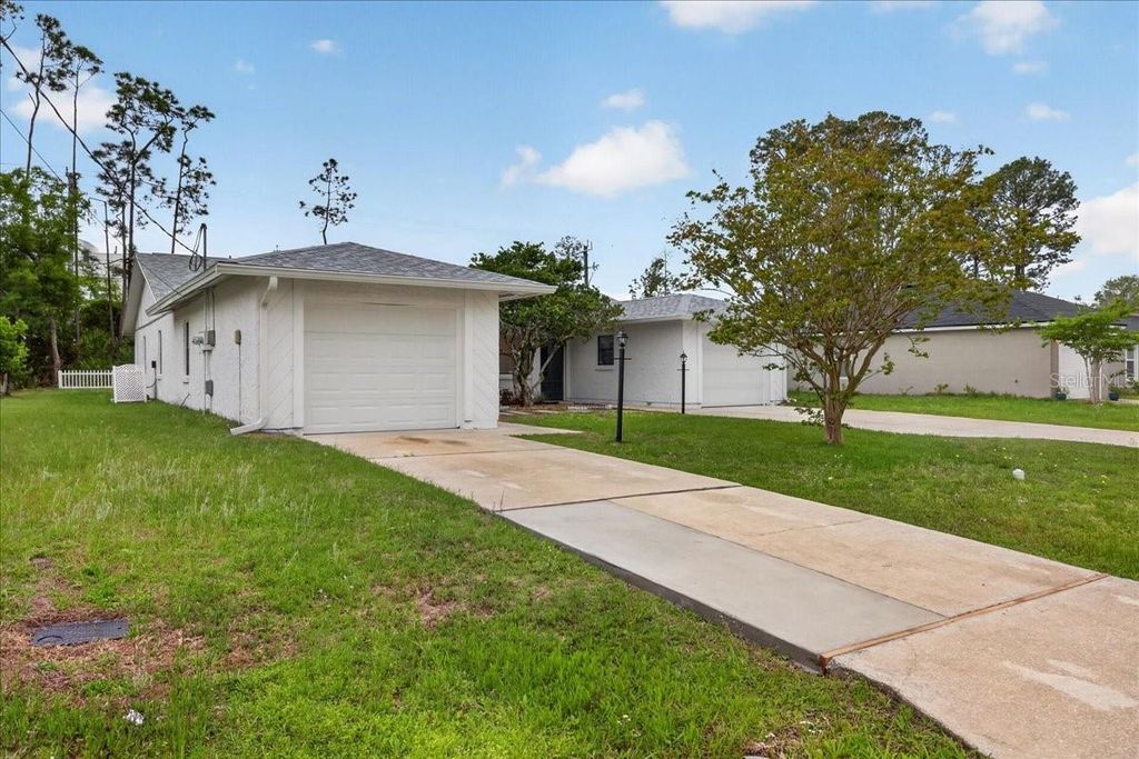Photo of 10 Bren Mar Lane, Palm Coast, FL 32137 (MLS # FC319150)