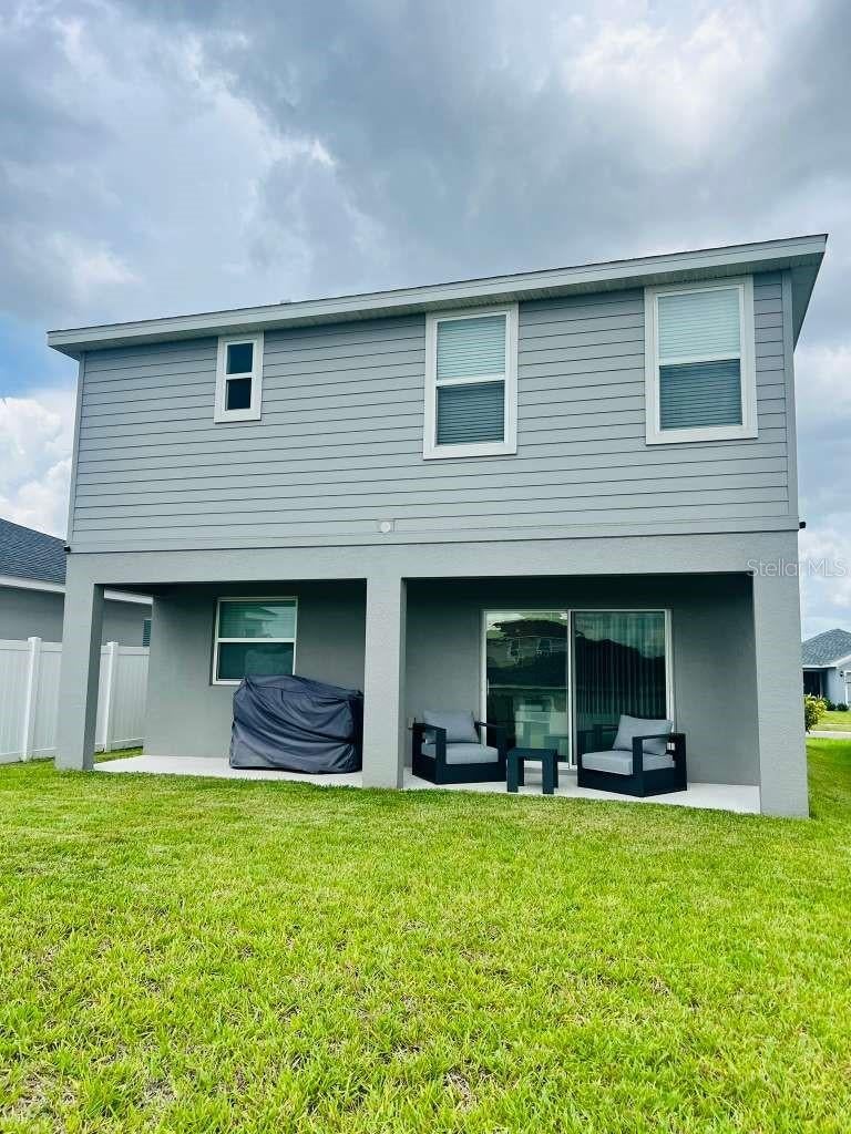 Photo of 2223 Orchid Drive, Davenport, FL 33837 (MLS # O6438623)
