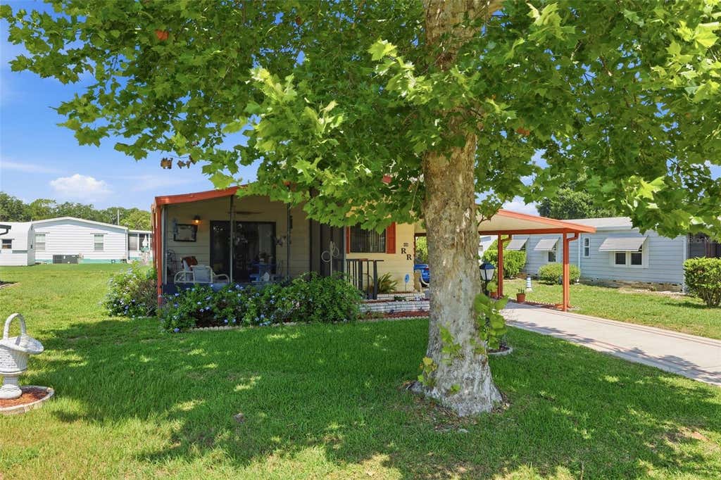 Photo of 409 Tivoli Park Drive, Davenport, FL 33897 (MLS # O6421187)