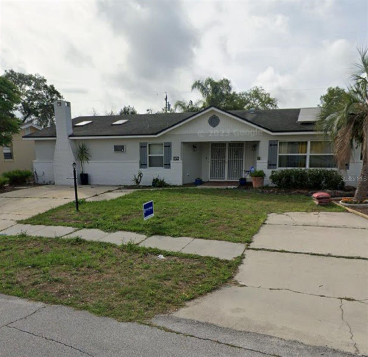 One or more photo(s) has been virtually staged. Spacious 3BR/2BA home with 2,300 sq. ft. in a quiet Deltona neighborhood, minutes from I-4. This property features a large enclosed den with fireplace and bar area—ideal for a man cave, she shed, or entertainment space—with direct access to the backyard and pool. The home offers a screened-in pool with patio, big backyard, and an indoor laundry room with washer & dryer. Energy-efficient solar panels are included, and seller will be installing a brand-new roof for the buyer’s peace of mind. While the home needs some updating, its size, layout, and features provide incredible potential. Motivated seller—don’t miss out!