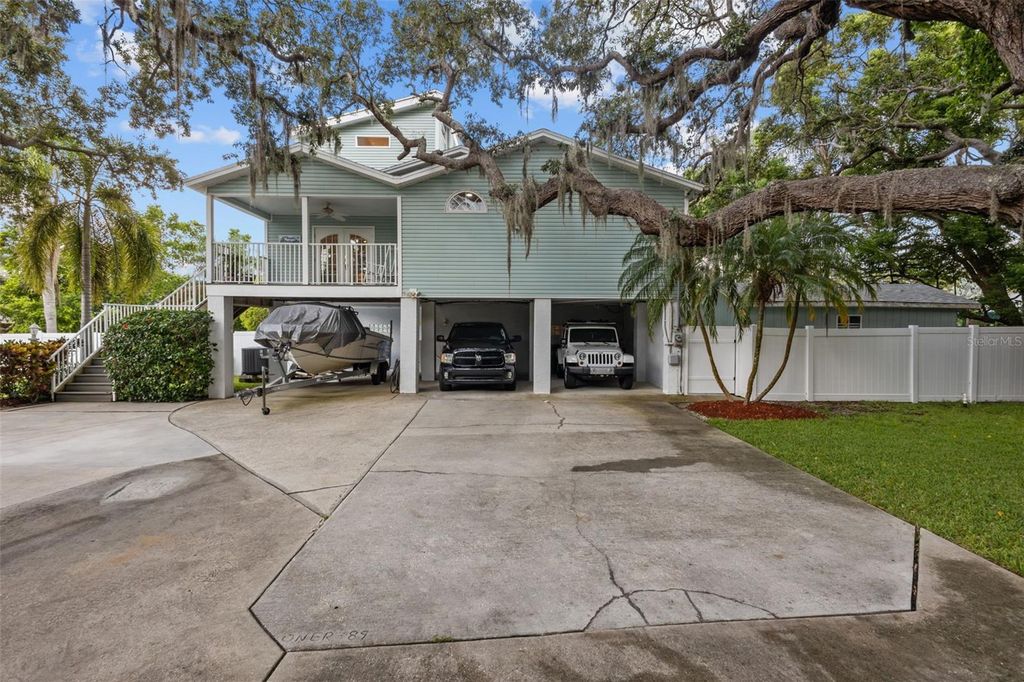Photo of 405 Charleston Avenue, Crystal Beach, FL 34681 (MLS # TB8411978)