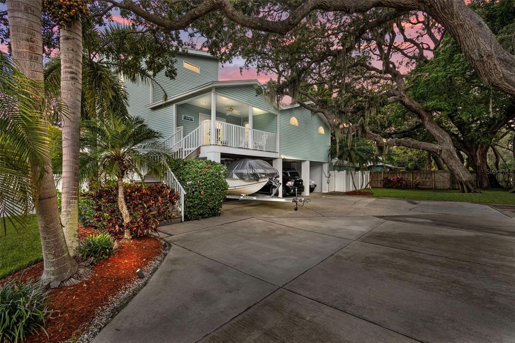 Photo of 405 Charleston Avenue, Crystal Beach, FL 34681 (MLS # TB8411978)