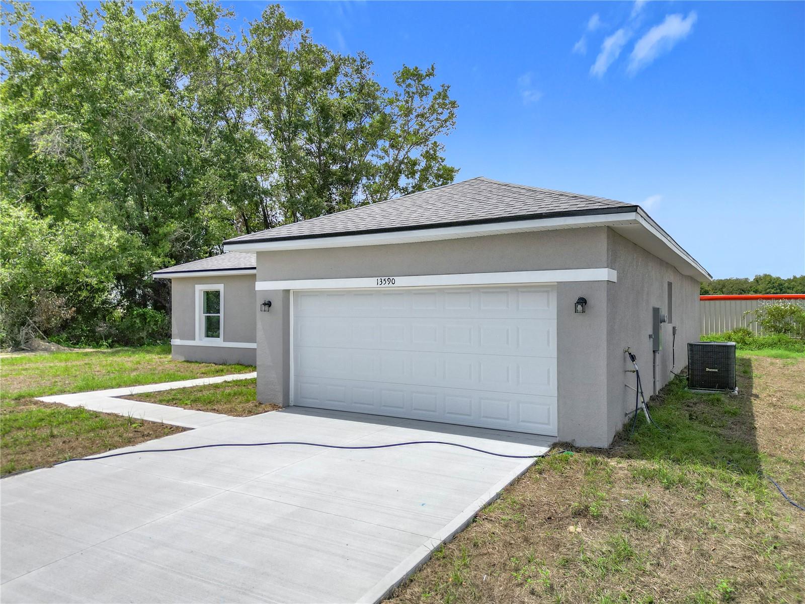 One or more photo(s) has been virtually staged. One or more photo(s) has been virtually staged.
Welcome to this brand-new 4-bedroom, 2-bath home in Ocala! Step into an open living area designed for comfort and style, and enjoy a modern kitchen with stainless steel appliances, stone countertops, and abundant storage. The private master suite features a walk-in closet and elegant bath, while three additional bedrooms provide space for family, guests, or a home office.
A two-car garage adds convenience and storage. Located in a growing Ocala community, this home is move-in ready and waiting for you. Seller is offering $6000 in concessions toward buyer’s closing costs if closed at listing price. Schedule your showing today!
