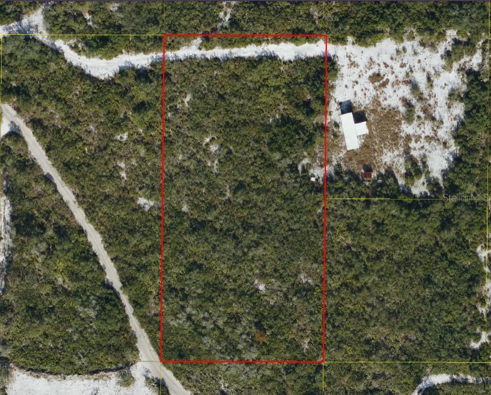 This property is for recreational use only. Owning a lot in Suburban Estates entitles you to a key for the main gate and
entry to Suburban Estates. Suburban Estates covers over 11,000+ acres of land which is known for camping, fourwheeling,
fishing, hunting, etc. This is not a buildable lot. Owner does not have key to gate. Please call agent if you are
not familiar with Suburban Estates. Due to the nature of this type of property, showings are not given by listing agent.
You may use the coordinates provided to view the aerials that are available on Google earth or visit the Osceola County
Property Appraisers website to get an overview of the area.