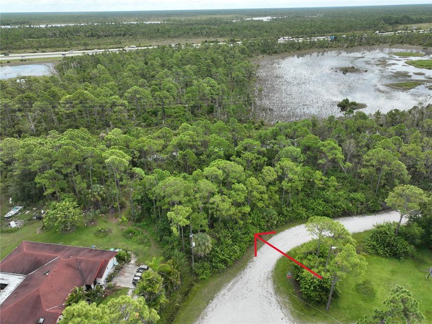 Great privacy lot, no rear neighbors with small water view. With and easy access to US 41 and I-75. Quiet country-like setting but close to everything. NO HOA, this is the perfect lot! Utilities are available nearby, and the property will require a well and septic system. Lot is not in a Scrub-Jay area. Close to Golf Courses, Historic Downtown Punta Gorda, Fisherman's Village where you can enjoy Waterfront Dining, Unique Boutiques, Sunset Cruises and Fishing Charters for World Class Fishing. Punta Gorda Airport is a few miles away. The lot next door is also available!