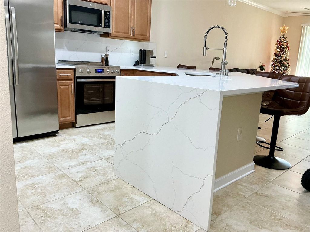 Photo of 3550 Fairwaters Court #C, Clermont, FL 34711 (MLS # O6368915)