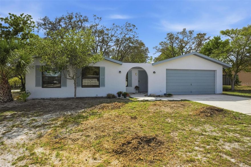 Take a look at this fully renovated home with freshly painted exterior, the beautiful community of The Heather in Weeki Wachee. This 3-bedroom, 2-bath home with a 2-car garage and BRAND-NEW ROOF 2026, offers an amazing opportunity to move right in. As you enter you will immediately notice the freshly painted interior and brand new LVP flooring throughout. The spacious living room offers nice big windows creating a light and bright space to sit and enjoy time with family and friends. The thoughtfully designed kitchen features real wood cabinets with ample counter and cupboard space, along with brand-new stainless-steel appliances and an adjoining dining area.  Down the hall from the kitchen, you will find all three fully renovated bedrooms and bathrooms with plenty of closet space for storage. Additionally, your freshly painted screened lanai with brand new indoor/outdoor carpeting offers a serene space to unwind and appreciate the tranquil surroundings.
The Heather is a well-maintained, established golf-course community that benefits from low HOA fees and a variety of amenities, a clubhouse, and beautifully landscaped grounds. Conveniently situated near shopping, dining, and the renowned Weeki Wachee Springs, this property represents a remarkable opportunity in a highly desirable neighborhood. Come take a look before it’s gone!