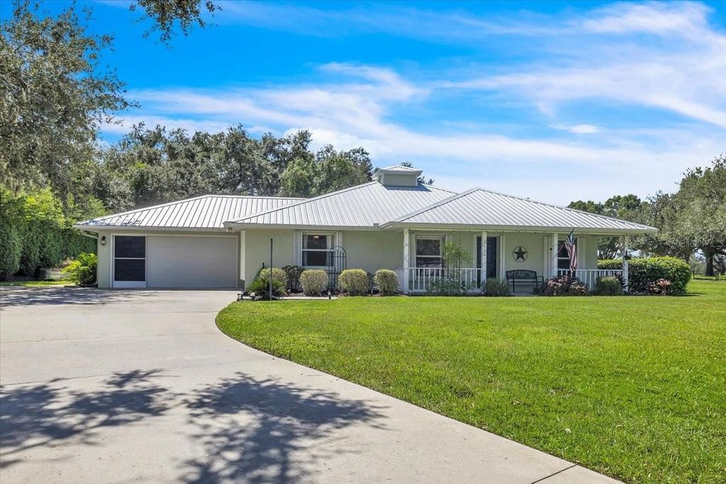 Photo of 2124 NE Voss Oaks Circle, Arcadia, FL 34266 (MLS # A4666284)