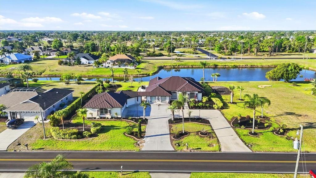 Photo of 646 Boundary Boulevard, Rotonda West, FL 33947 (MLS # D6144742)