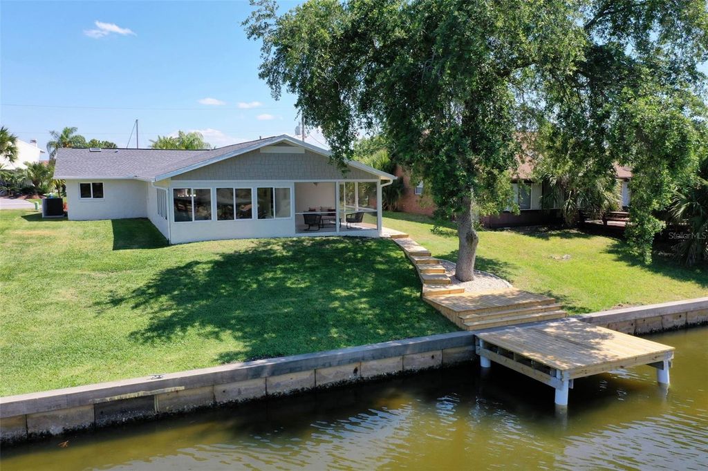 Photo of 13 Cedarwood Court, Palm Coast, FL 32137 (MLS # FC314984)