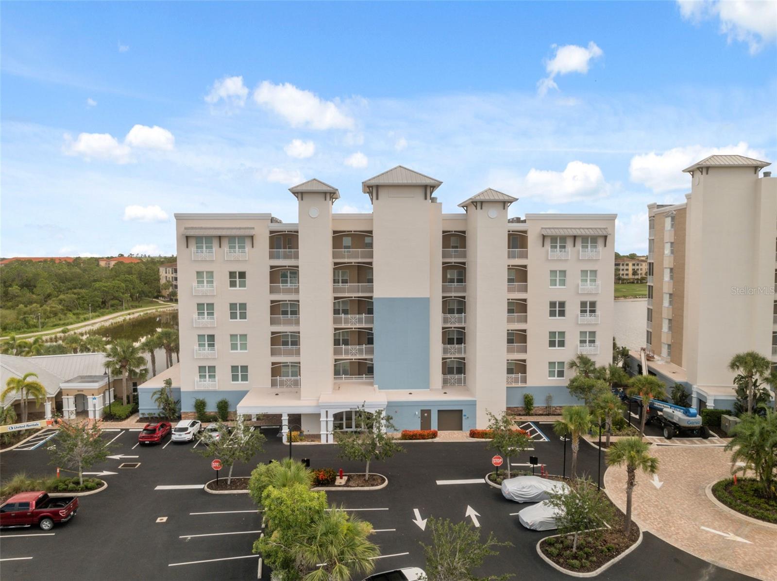 Welcome to 10530 Boardwalk Loop #305, a bright and stylish three-bedroom condominium offering lakefront views and a resort-inspired lifestyle in the heart of Lakewood Ranch. Perfectly situated in the Waterfront at Main Street community, this residence combines easy living with vibrant neighborhood amenities, ideal for those seeking both relaxation and convenience. The Gated community offers Pool, Fitness center, and you can walk to shoppings, dinining, starbucks, banks and hospital, more and mins to groceries like Publix and UTC shipping center.
From the moment you enter this third-floor unit, you’re greeted by an open floor plan that seamlessly connects the main living, dining, and kitchen areas. Expansive windows and sliding doors bring in abundant natural light while showcasing peaceful lake views. A spacious covered lanai extends your living space outdoors, providing the perfect setting for morning coffee, evening gatherings, or quiet reflection with a water backdrop.
The kitchen is designed with both functionality and style in mind, featuring solid-surface counters, porcelain tile flooring, and ample cabinet storage. Whether cooking for yourself or entertaining guests, the kitchen flows beautifully into the living area, creating an inviting space that’s both practical and comfortable. High ceilings and thoughtful details such as crown molding and ceiling fans enhance the sense of openness.
The primary bedroom offers direct access to the balcony, allowing you to wake up to stunning views of Lake Uihlein. The suite includes a well-sized bathroom with dual sinks, a walk-in shower, and modern finishes for a relaxing retreat. Two additional bedrooms, each with their own closets and easy access to a second full bath, provide plenty of room for family, guests, or a dedicated office.
Enjoy peace of mind with assigned under-building parking and secured entry, along with convenient elevator access to your floor. The building’s construction combines brick and stucco exteriors with concrete and shingle roofing, offering durability and timeless curb appeal.
This residence comes with access to an array of community amenities designed to enhance your lifestyle. Residents can enjoy a heated saltwater pool, spa, fitness center, and beautifully maintained grounds perfect for walking and socializing. The community’s setting along Lake Uihlein provides opportunities for waterfront strolls, bird watching, and outdoor enjoyment. Pet owners will appreciate the community’s pet-friendly policies, with areas to walk dogs and meet fellow residents.
Beyond the gates, Lakewood Ranch’s Main Street is just a short walk away, offering a selection of dining, shopping, entertainment, and professional services. The vibrant neighborhood atmosphere provides a calendar of community events, farmers’ markets, and live music, ensuring there’s always something to do close to home. Quick access to I-75 places Sarasota’s beaches, downtown dining, and cultural attractions within easy reach.
With a low-maintenance condominium lifestyle, this residence is an ideal choice for full-time residents, seasonal owners, or those looking for a comfortable lock-and-leave property. The combination of serene lake views, a practical floor plan, and resort-level amenities creates a home that truly supports both daily comfort and an active social life.
Experience the blend of convenience, beauty, and community that awaits you!