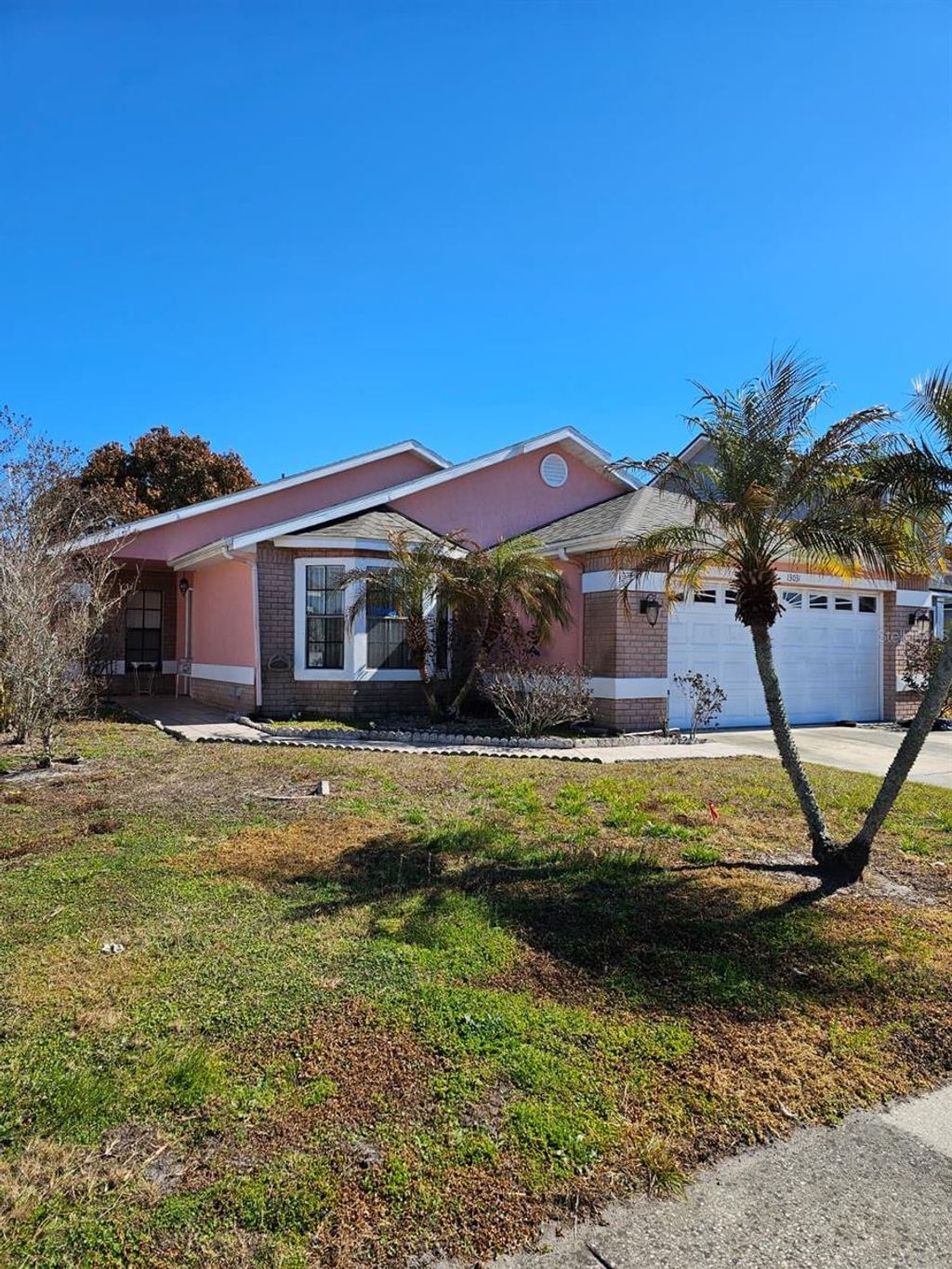 Photo of 13031 San Diego Woods Lane, Orlando, FL 32824 (MLS # O6381315)