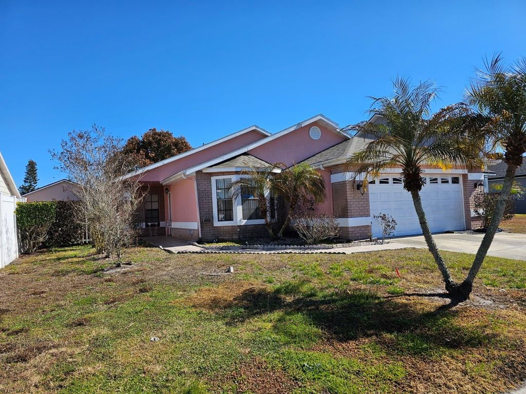 Photo of 13031 San Diego Woods Lane, Orlando, FL 32824 (MLS # O6381315)