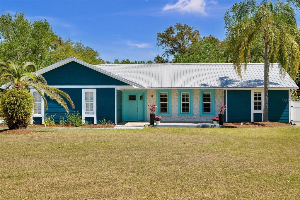 Photo of 245 Country Circle Drive E, Port Orange, FL 32128 (MLS # O6434900)