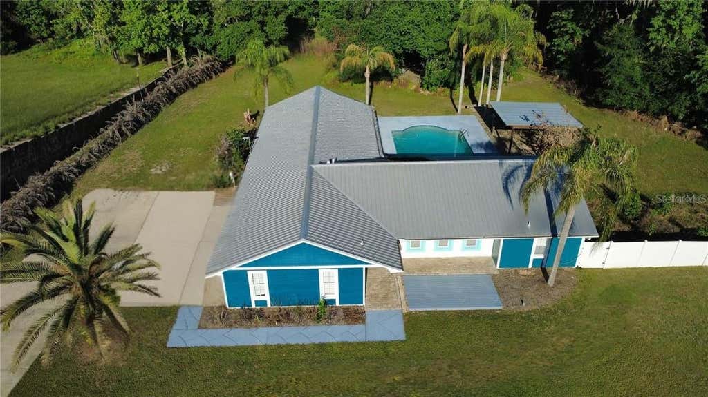 Photo of 245 Country Circle Drive E, Port Orange, FL 32128 (MLS # O6434900)