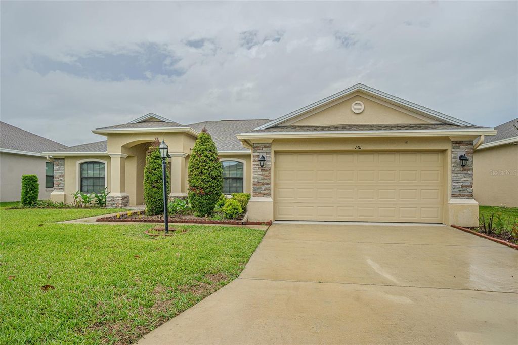 Photo of 1311 Evergreen Park Circle, Lakeland, FL 33813 (MLS # TB8496948)