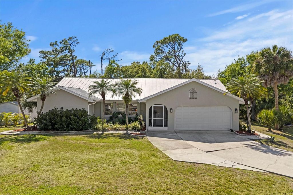 Photo of 935 Baer Avenue NW, Port Charlotte, FL 33948 (MLS # A4687632)