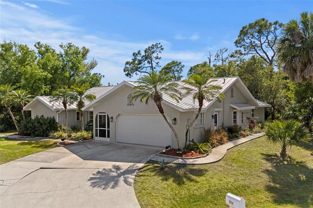 Photo of 935 Baer Avenue NW, Port Charlotte, FL 33948 (MLS # A4687632)