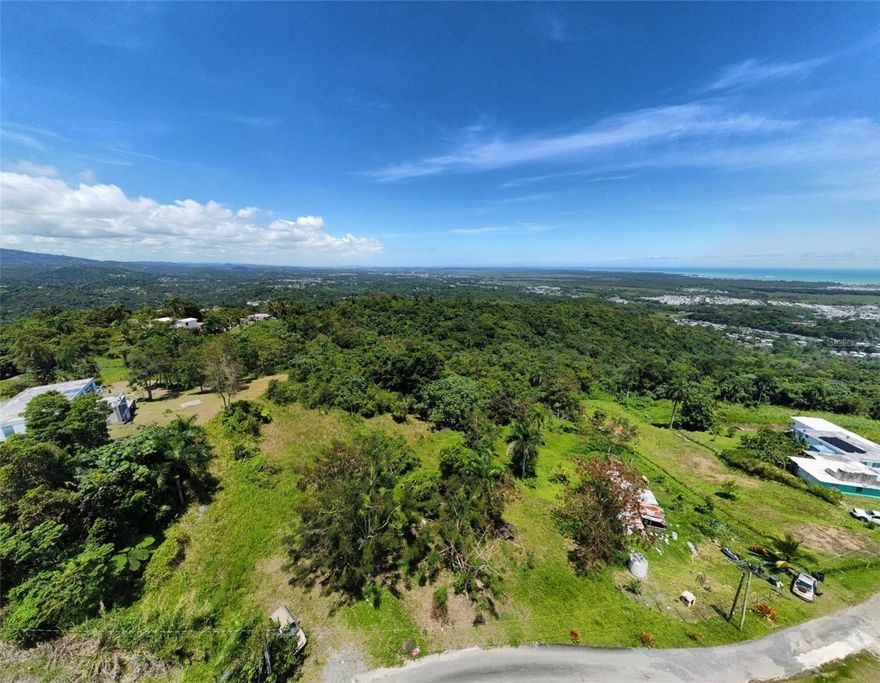 Indulge in the opportunity to own an exceptional 2-acre estate parcel showcasing breathtaking, unobstructed views of Puerto Rico’s coveted northeastern coastline. Perfectly positioned with effortless access from Route #3 and just approximately 30 minutes from Luis Muñoz Marín International Airport, this property offers a rare balance of privacy, prestige, and convenience.
Whether you envision a modern architectural masterpiece or a serene tropical sanctuary, this is a rare chance to secure a premier piece of land in one of Puerto Rico’s most promising and picturesque coastal settings. Build your dream home in the desirable community of El Zarzal, Río Grande—an area experiencing exciting growth, with new homeowners actively developing modern residences. This is a prime opportunity to invest in a rapidly emerging neighborhood while enjoying scenic beauty and a peaceful setting.