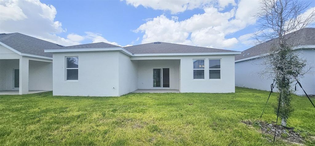Photo of 500 Silver Palm Drive, Haines City, FL 33844 (MLS # O6394812)