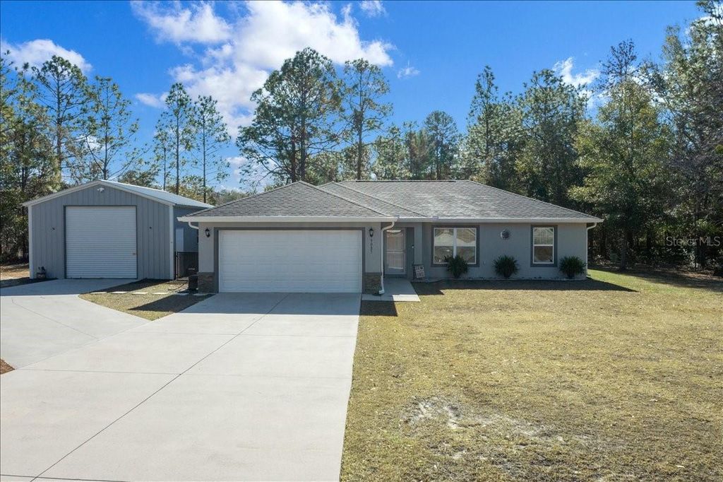 Photo of 9085 SW 202nd Avenue Road, Dunnellon, FL 34431 (MLS # OM718325)