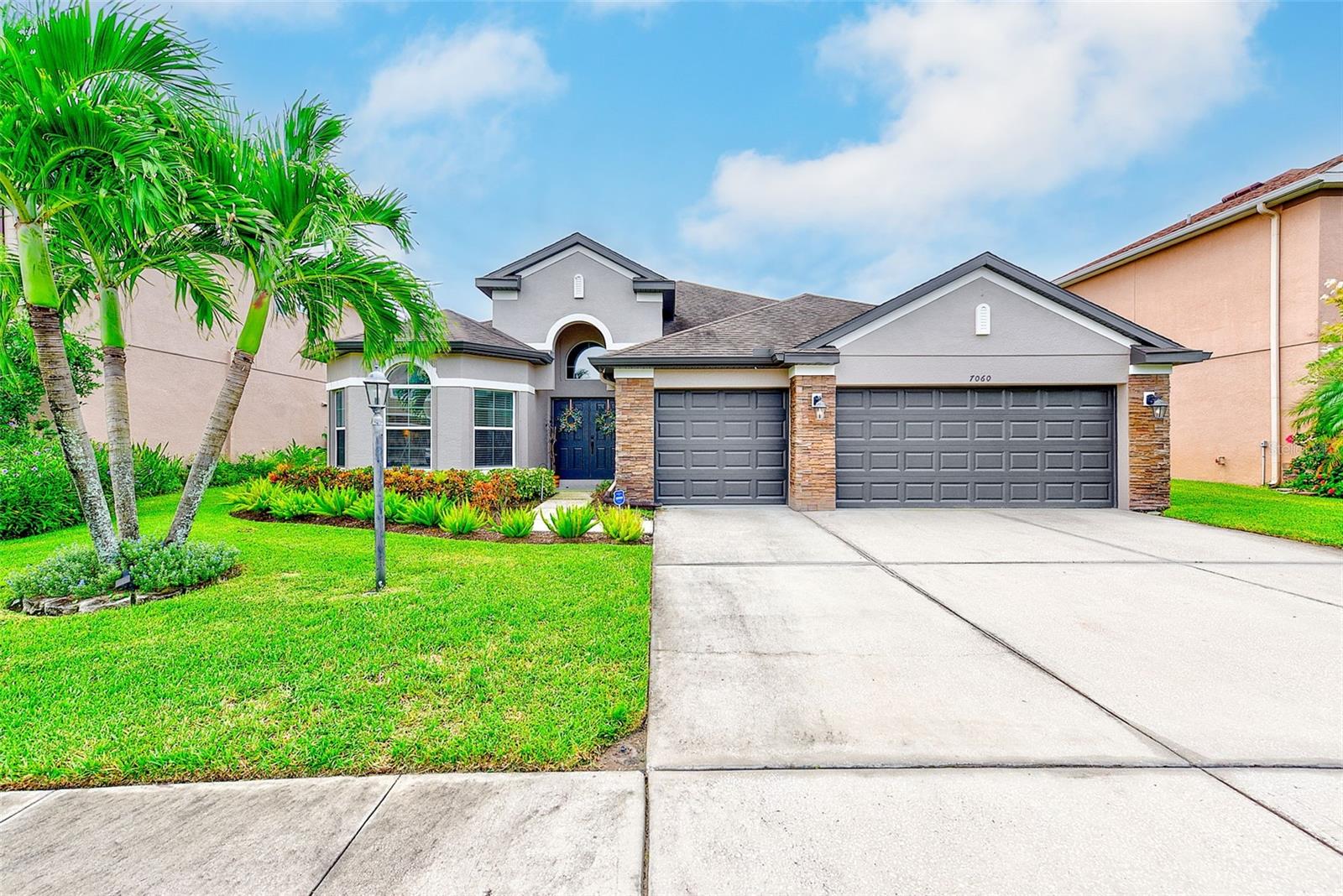 Welcome to your dream home in the sought-after Bayou Cove, Tampa Bay! Built in 2013, this beautiful residence features 4 spacious bedrooms, 3 bathrooms, and a versatile office/den, all within a functional split-plan layout and complemented by a 3-car garage. Dive into luxury with a brand-new pool, perfect for both relaxation and entertainment. Enjoy the convenience of cable and internet included in the HOA. The gourmet kitchen showcases quartz countertops, custom wood cabinetry, newer appliances, and a breakfast bar that opens to the family room. Designed for both formal and casual gatherings, the home offers two living areas, a formal dining room, an indoor laundry room, and a stylish dry bar—perfect for entertaining. Elegant finishes include high ceilings, a neutral color palette, and updated laminate wood plank flooring throughout. Recent upgrades include a brand-new AC system (still under warranty), a freshly painted exterior, and new carpet in the bedrooms, ensuring comfort and curb appeal. The luxurious primary suite includes a massive walk-in closet and a spa-like bathroom with double vanities, a glass shower, jetted soaking tub, and private water closet. Additional features include a whole-house water filtration system, water softener, and a tankless water heater. Step outside to your private oasis: a screened patio with paver decking, retractable awning, sparkling pool, and a fully fenced yard for privacy and security. This stunning home offers exceptional comfort and peace of mind in a NO flood zone, and comes equipped with Kevlar hurricane shutters for added protection. Ideally located with quick access to Park Blvd, US-19, and I-275, you’ll be just minutes from Tampa, Clearwater, St. Petersburg, and the beaches. Contact us today to schedule your private showing and make this beautiful Bayou Cove home yours!