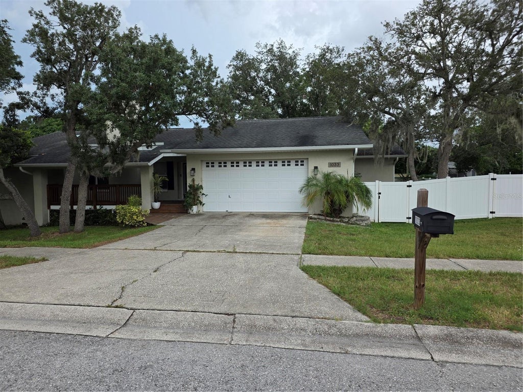 Photo of 1033 Rosetree Lane, Tarpon Springs, FL 34689 (MLS # W7888784)