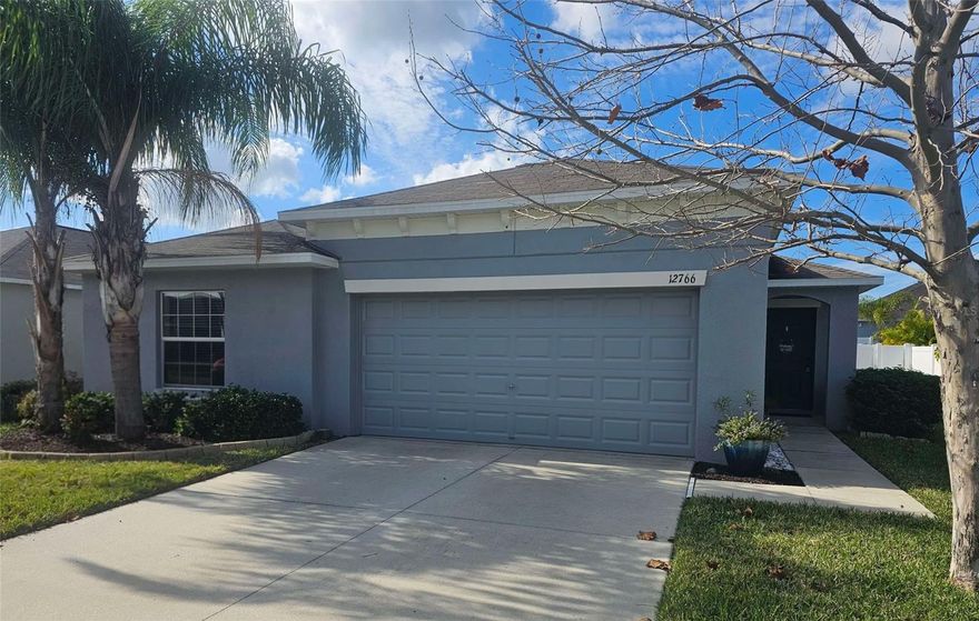 Back On Market, No Fault of Seller. Buyers loss is your gain! *Assumable 2.75% VA Mortgage*Move-In Ready, Packed with Upgrades! 
This beautifully maintained 4-bedroom, 2-bath home, built in 2018, is ready for its next owner! Step inside to discover an open-concept kitchen featuring stainless steel appliances, a breakfast bar, and plenty of space for cooking and entertaining. The split floor plan ensures privacy between the primary suite and guest bedrooms, ideal for families, guests, or those who work from home.

Enjoy low-maintenance living with stylish 18 inch tile flooring throughout and a 2-car garage equipped with a professionally installed EV charger wiring.

Located in a well-kept gated community, this home offers the perfect balance of privacy and convenience just minutes from I-75, downtown Tampa, and within 30 minutes of Tampa International Airport.