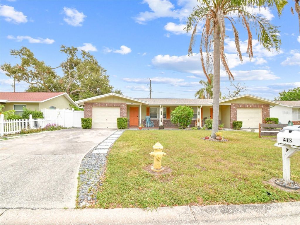 Photo of 411 Marjon Avenue, Dunedin, FL 34698 (MLS # TB8437654)