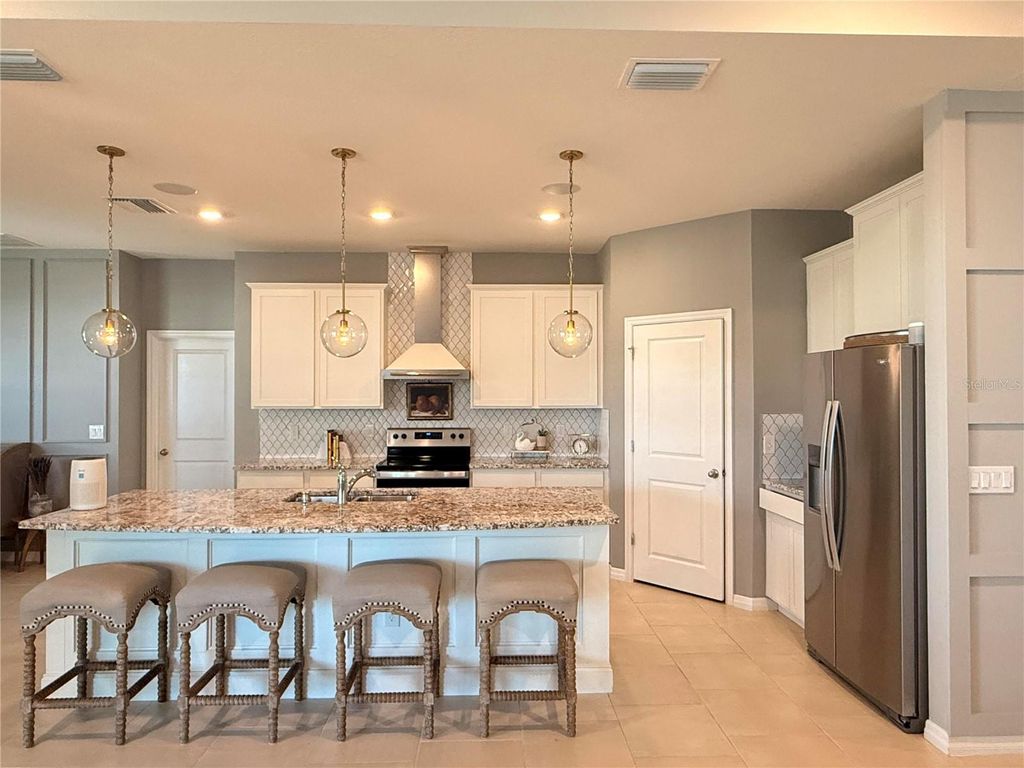 Photo of 10800 Laxer Cay Loop, San Antonio, FL 33576 (MLS # O6399100)